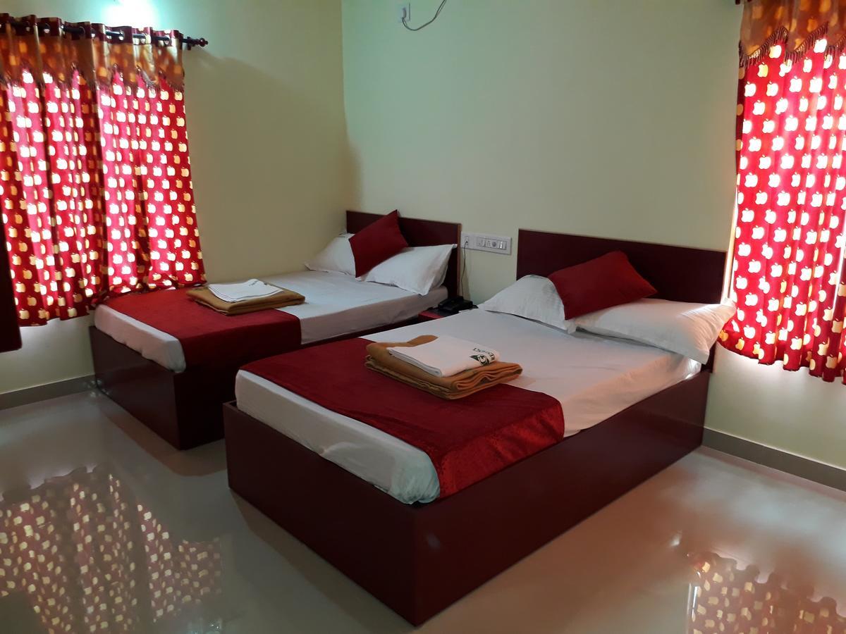 Hotel Ganga Residency Kuzhittura ภายนอก รูปภาพ
